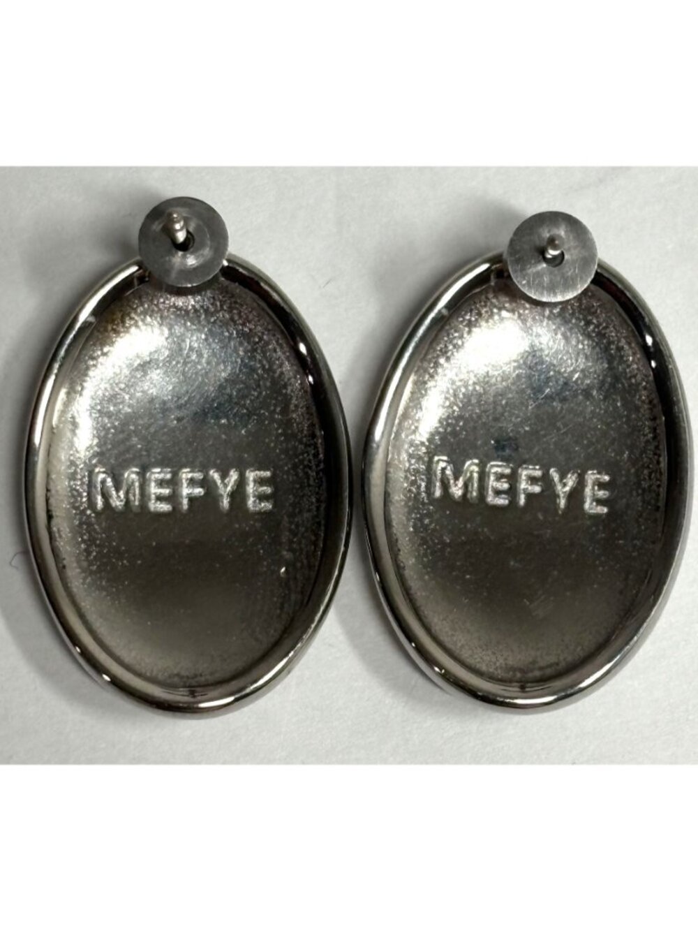 MEFYE Woven-Patterned Oval Studs in Silver Tone - Picture 3 of 3